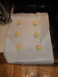 Gluten Free White Chocolate Macadamia Nut Cookie Dough on cookie sheet